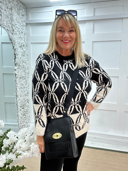 Macey: Black & cream pattern knit top. One size: 12-18