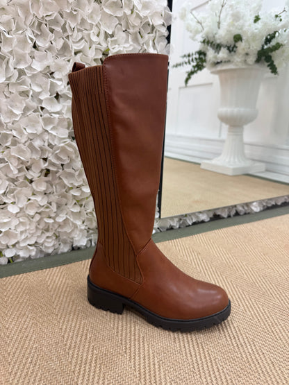 Trova: Tan stretchy knee high boots. Sizes 3-8