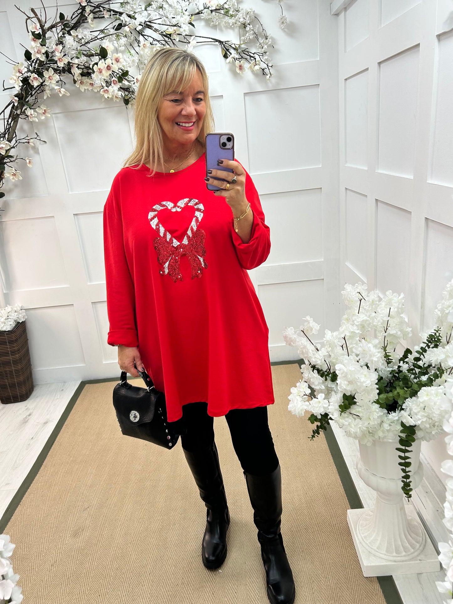 Candice: Red candy cane oversized top. One size: 16-20