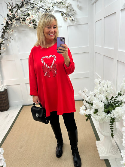 Candice: Red candy cane oversized top. One size: 16-20