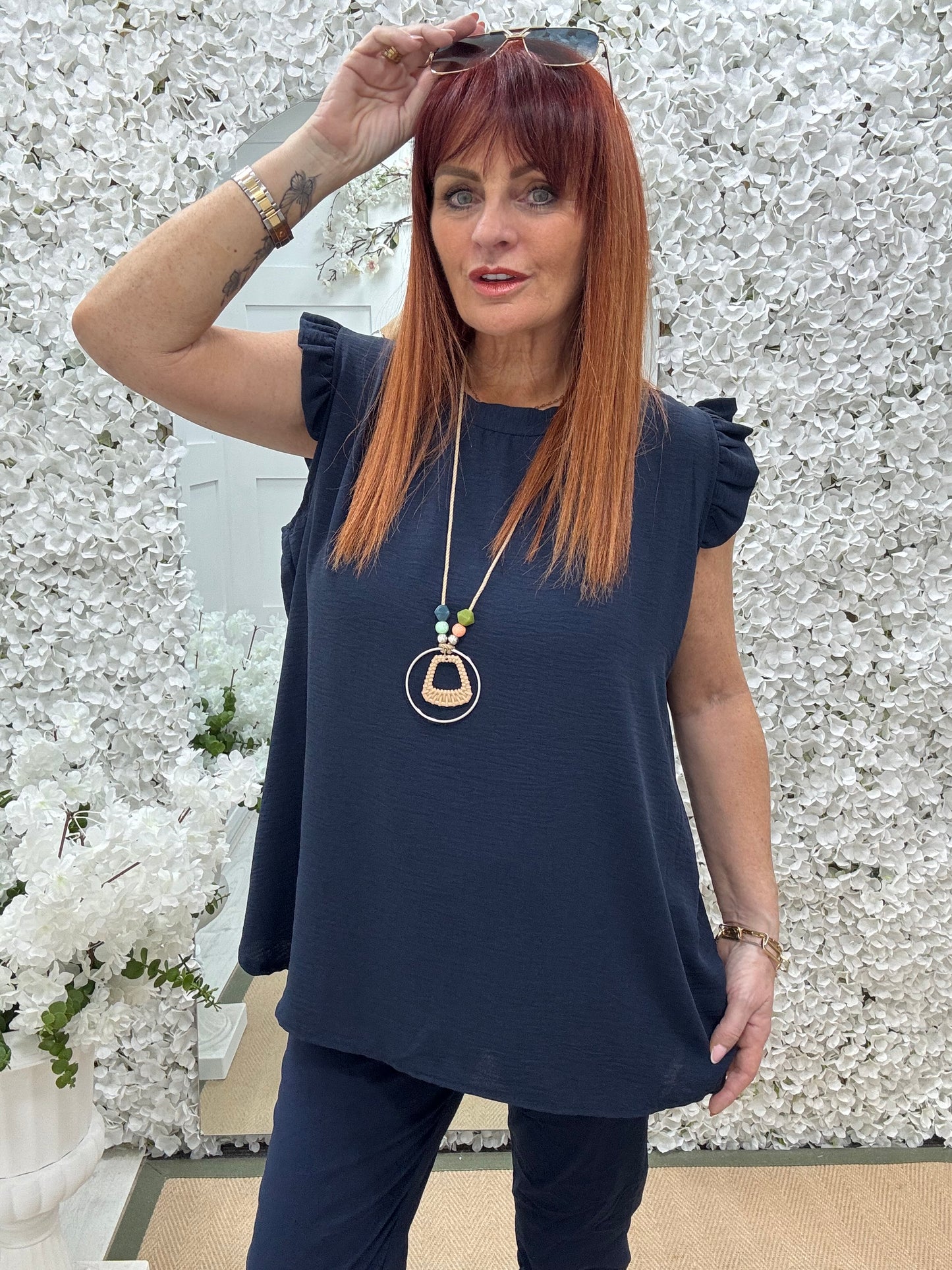 Ember: Navy frill sleeve top & pendant. One size: 14-20