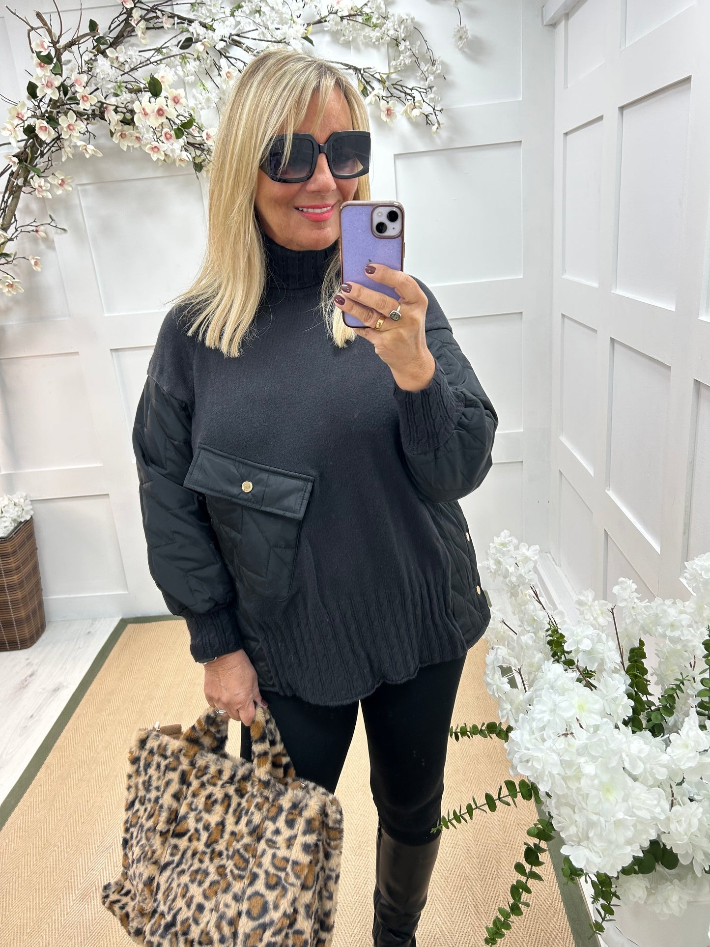 Harlo: Black quilted sleeve neck top. One Sz: 12-18