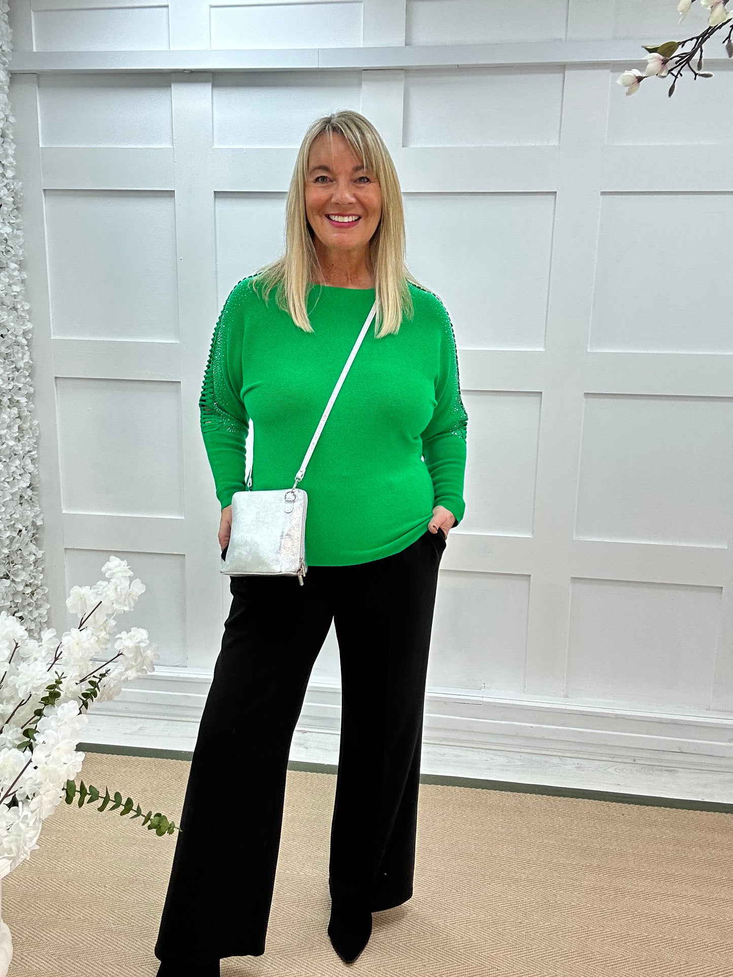 Arianne: Green sparkle cutout shoulder top. One size: 12-16