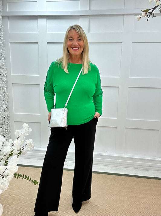 Arianne: Green sparkle cutout shoulder top. One size: 12-16