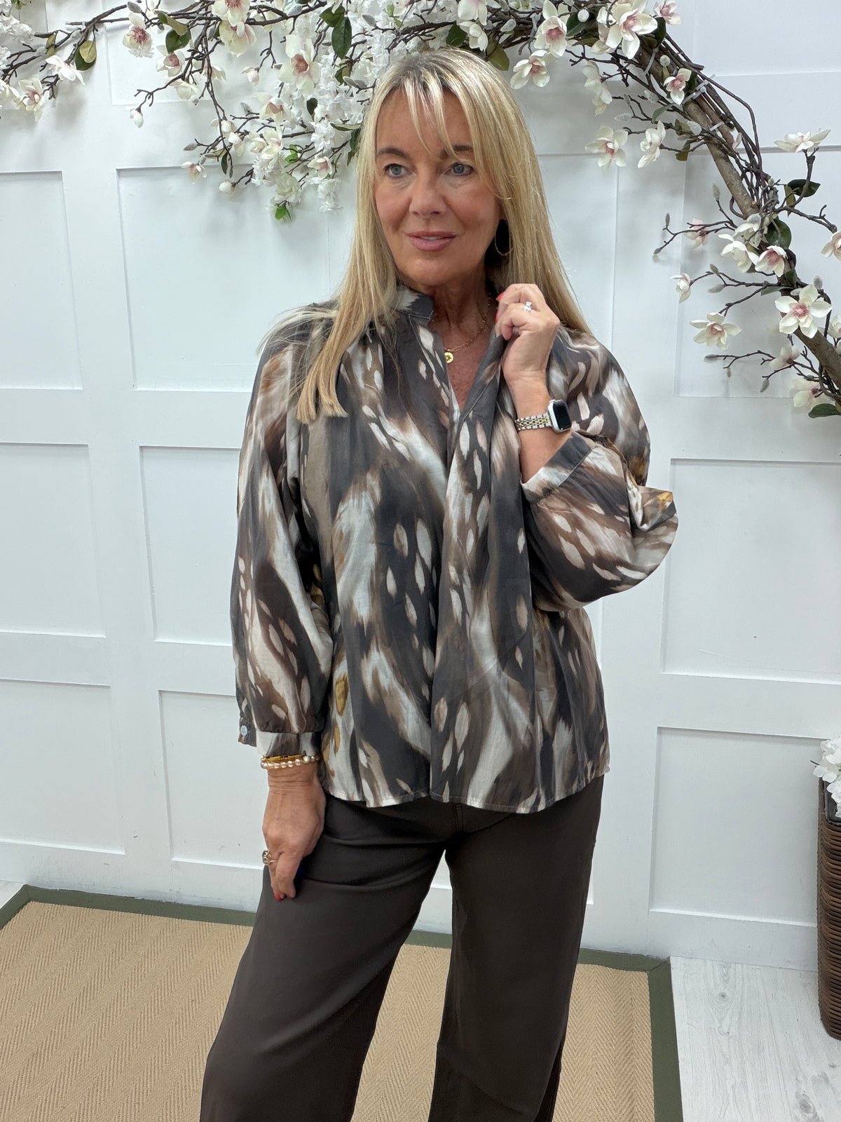 Brea: Brown animal print sheer blouse. One size: 12-18