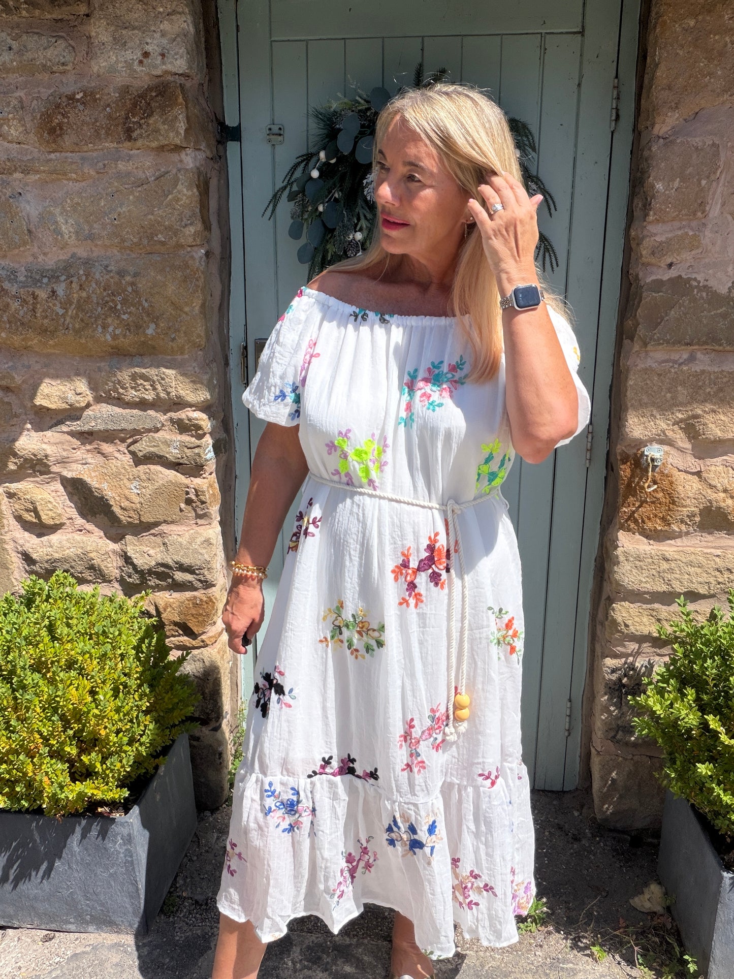 Minnie: Multicoloured embroidered floral bardot maxi dress. One size: 12-16