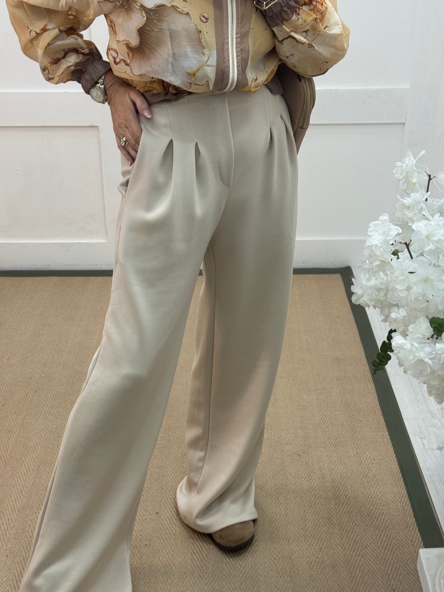 Tayla: Cream high waisted pleated wide leg trousers. One size: 10-16
