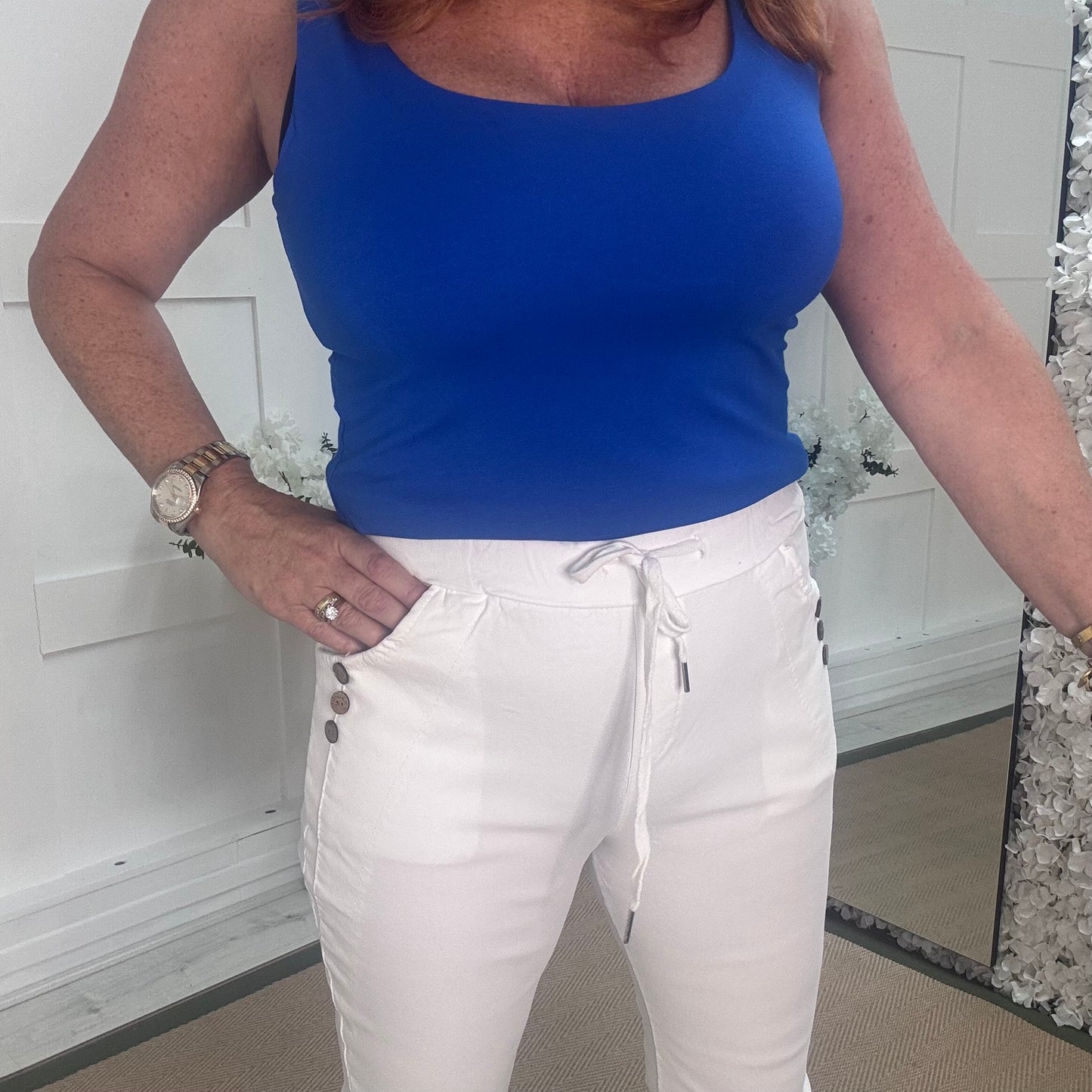 Betsy: Stretchy white button magic trousers. One size: 10-14