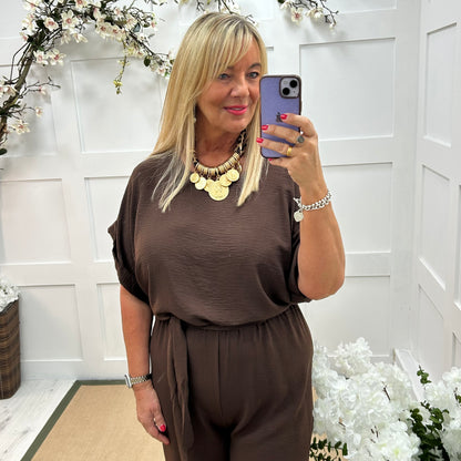 Jessica: Brown wide leg jumpsuit. One size: 14-18