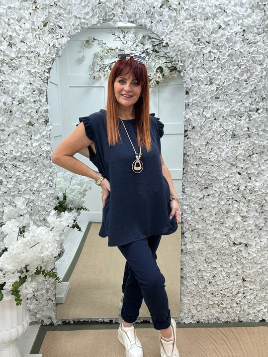 Ember: Navy frill sleeve top & pendant. One size: 14-20