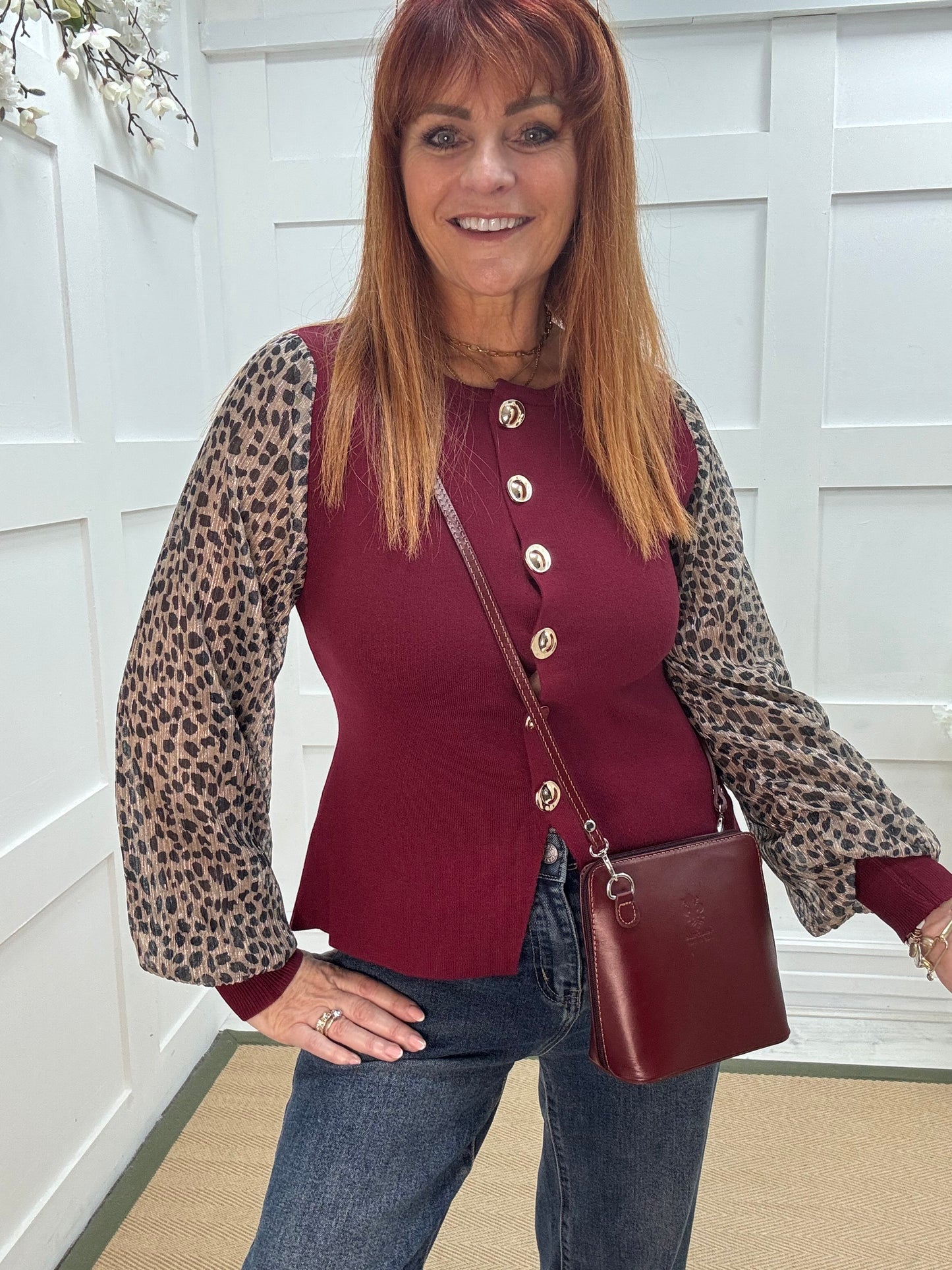 Carol: Burgundy leopard print sleeve fitted top. One size 10-14
