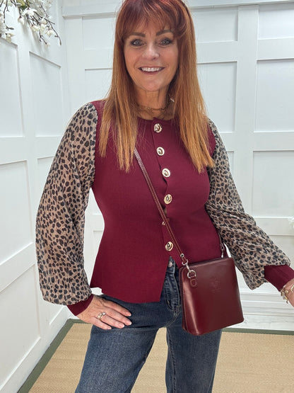 Carol: Burgundy leopard print sleeve fitted top. One size 10-14