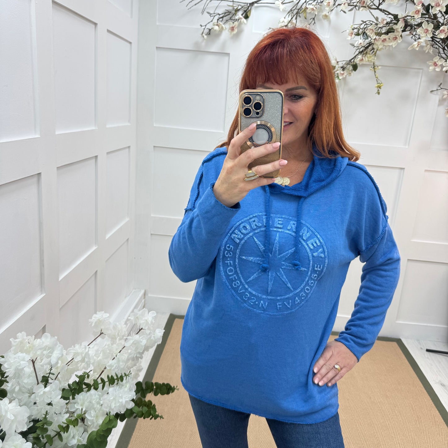 Sara: Cobalt hooded embossed compass top. One size: 12-18