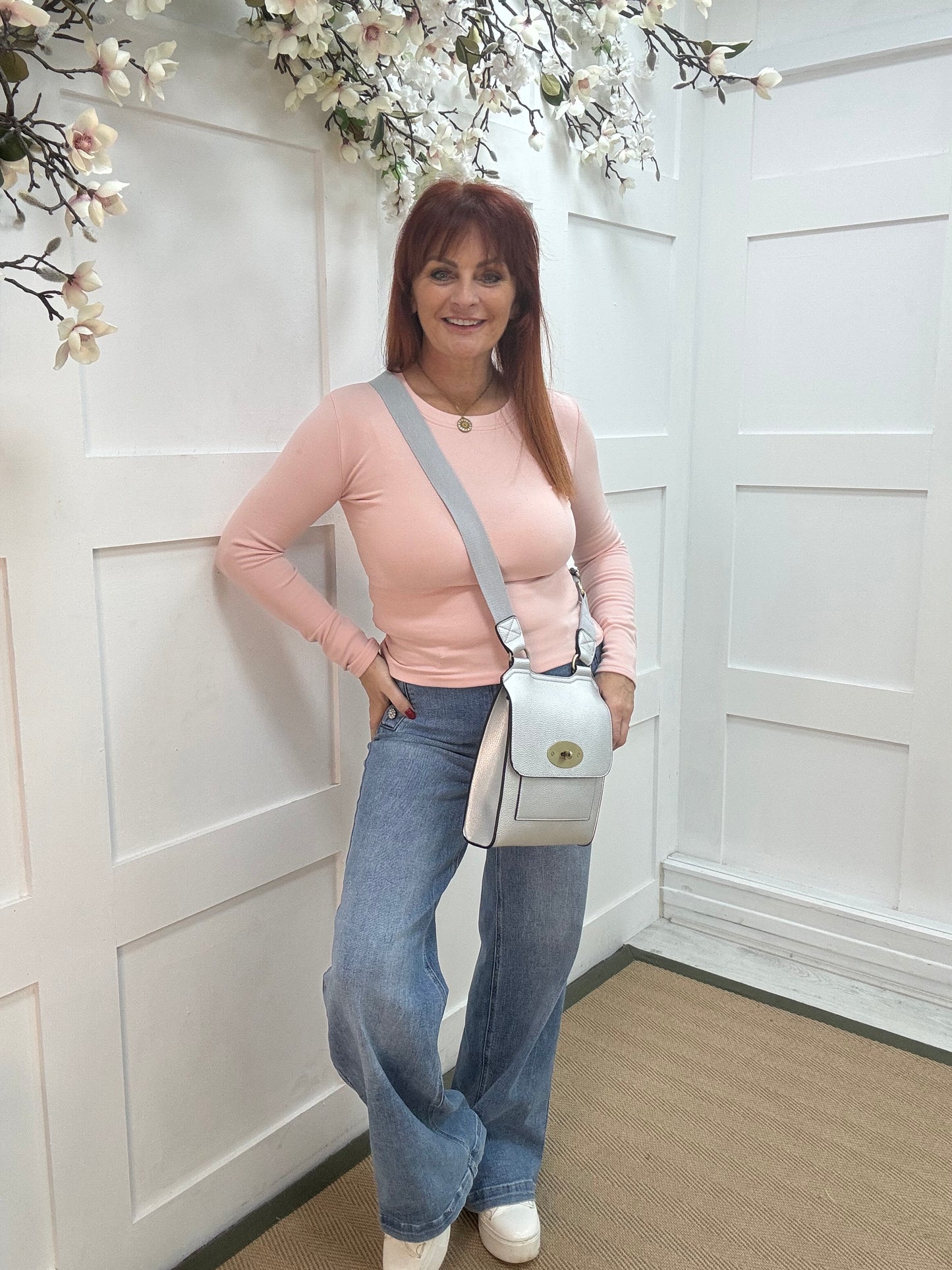 Penny: Baby pink round neck top. One Sz: 8-12