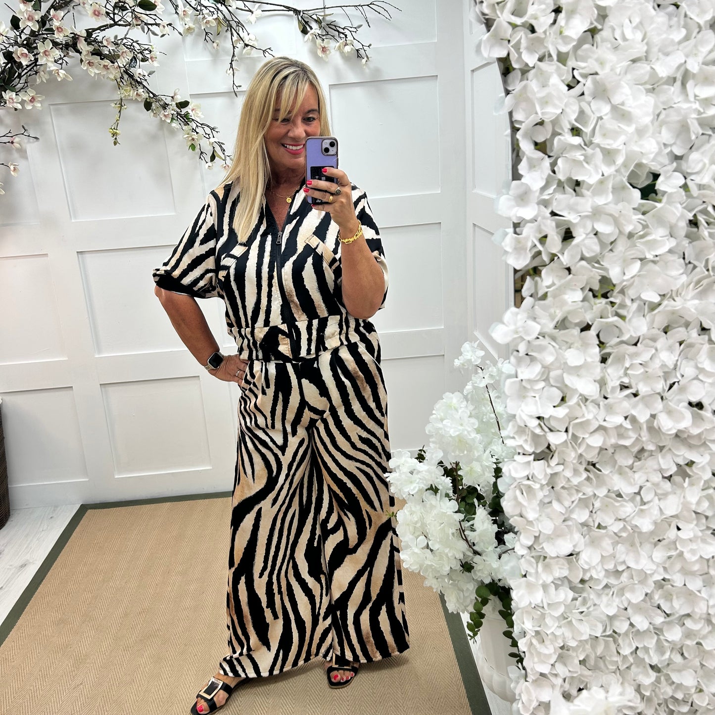 Aven: Black zebra print wide leg trousers. One size: 10-16