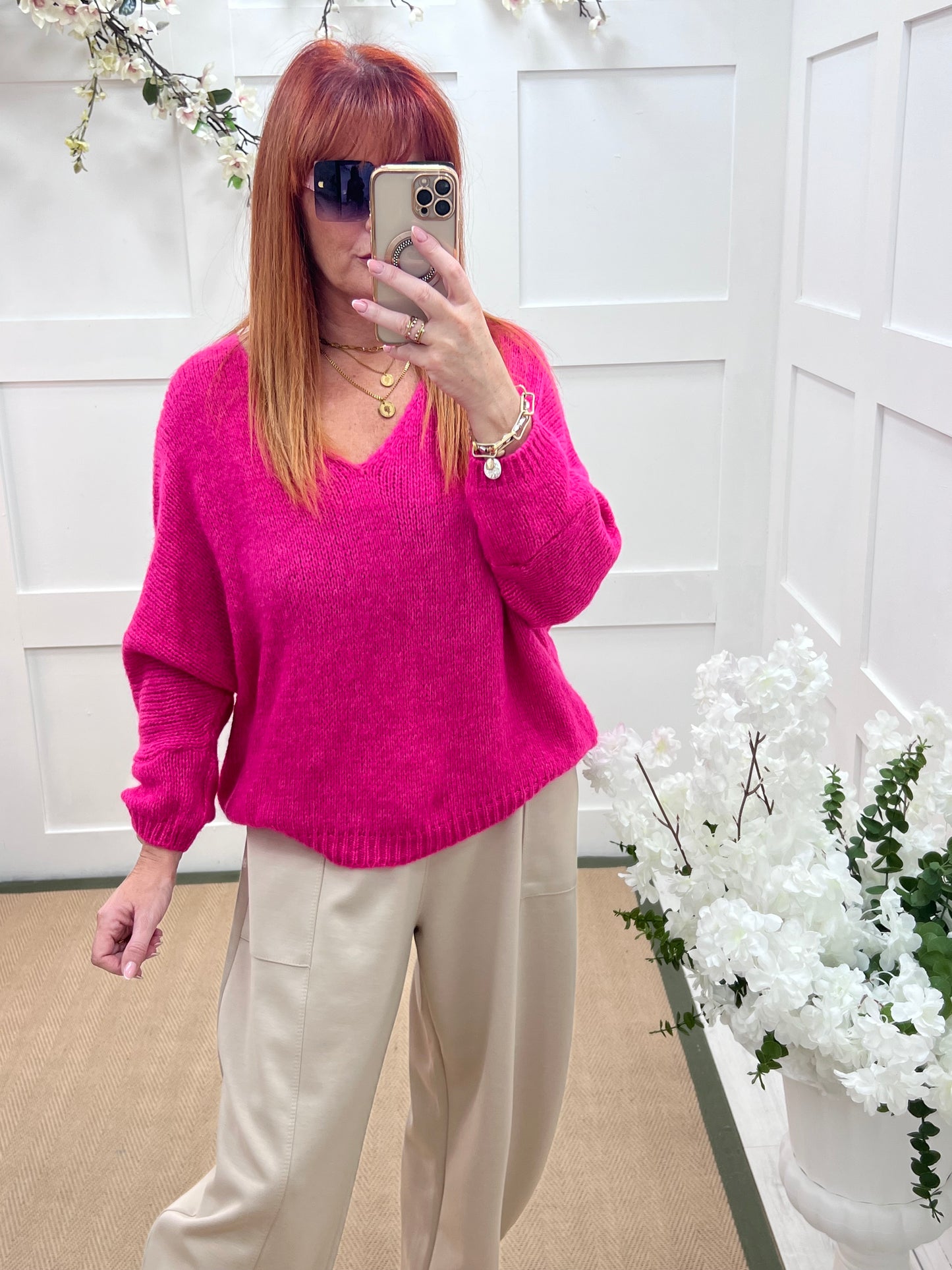 Alex: Hot pink V neck knitted top. One size 14-20