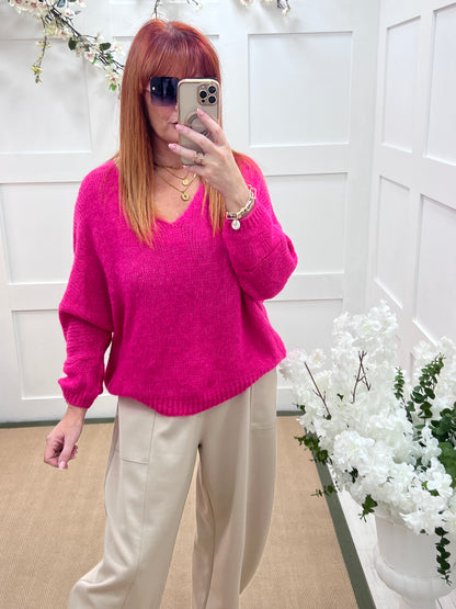 Alex: Hot pink V neck knitted top. One size 14-20