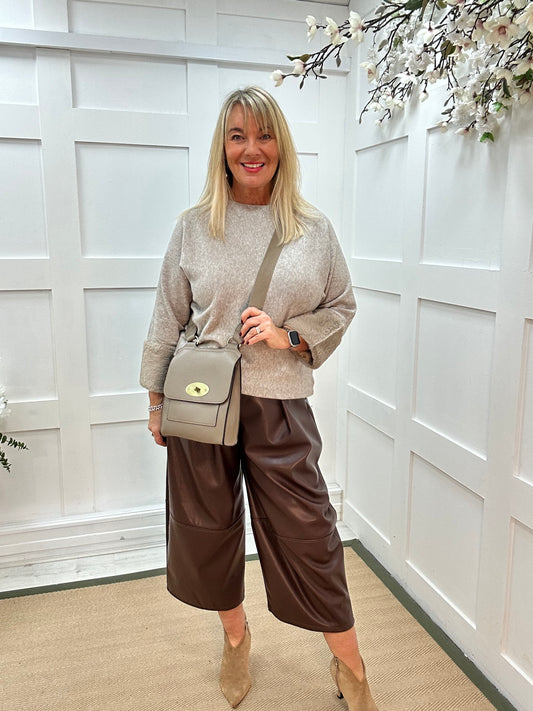 Coco: Oatmeal faux fur cuff knitted top. One size: 14-18