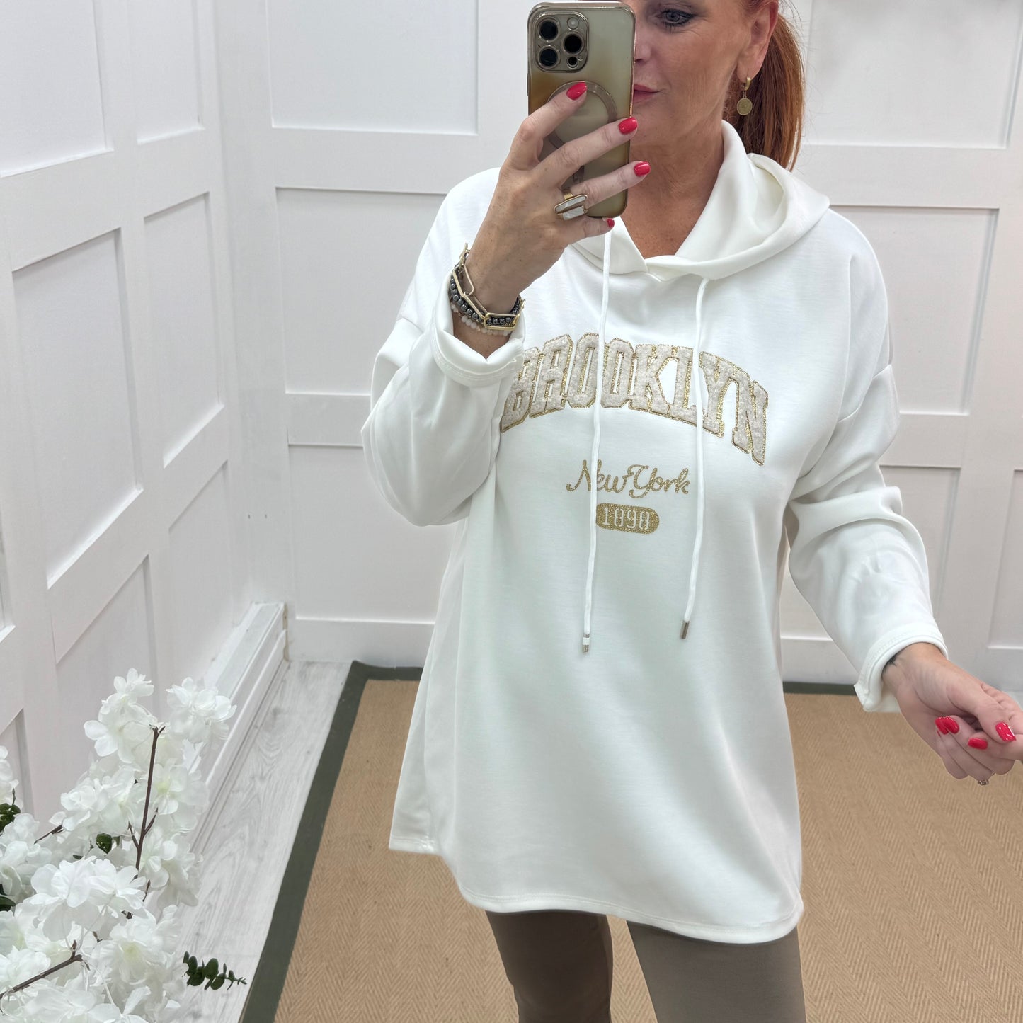 Madison: Baby blue Brooklyn logo hoodie. One size: 12-18