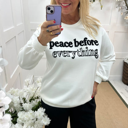 Prya: White oversized Peace slogan sweatshirt. One size: 14-20