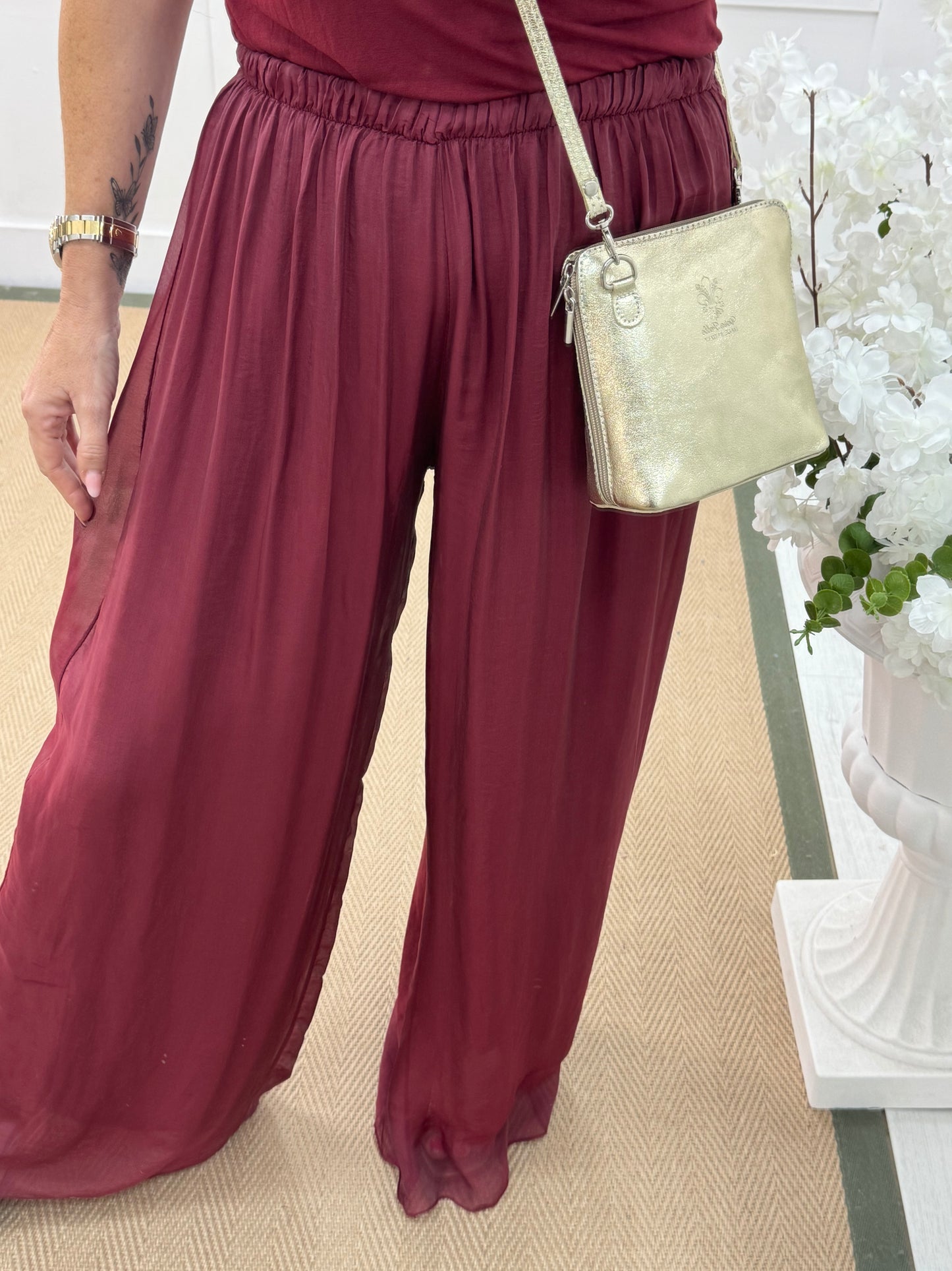 Venice: Burgundy silk wide leg trousers. One size: 12-20