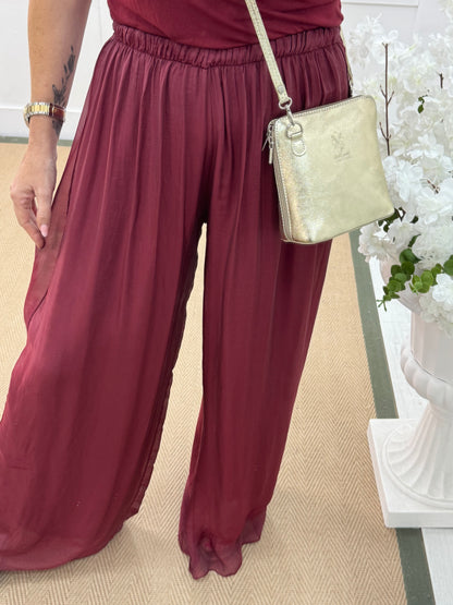 Venice: Burgundy silk wide leg trousers. One size: 12-20