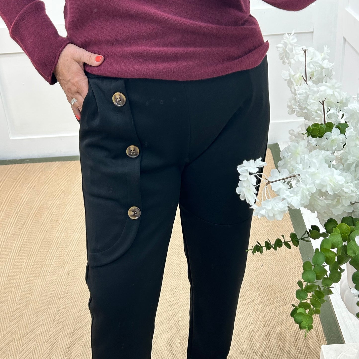 Monroe: Black stretchy button trousers. One size: 12-18