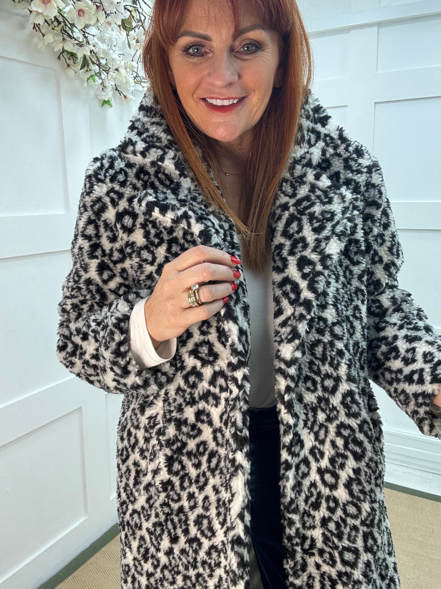 Daphnie: White leopard print teddy bear coat. One size 10-16