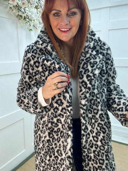 Daphnie: White leopard print teddy bear coat. One size 10-16