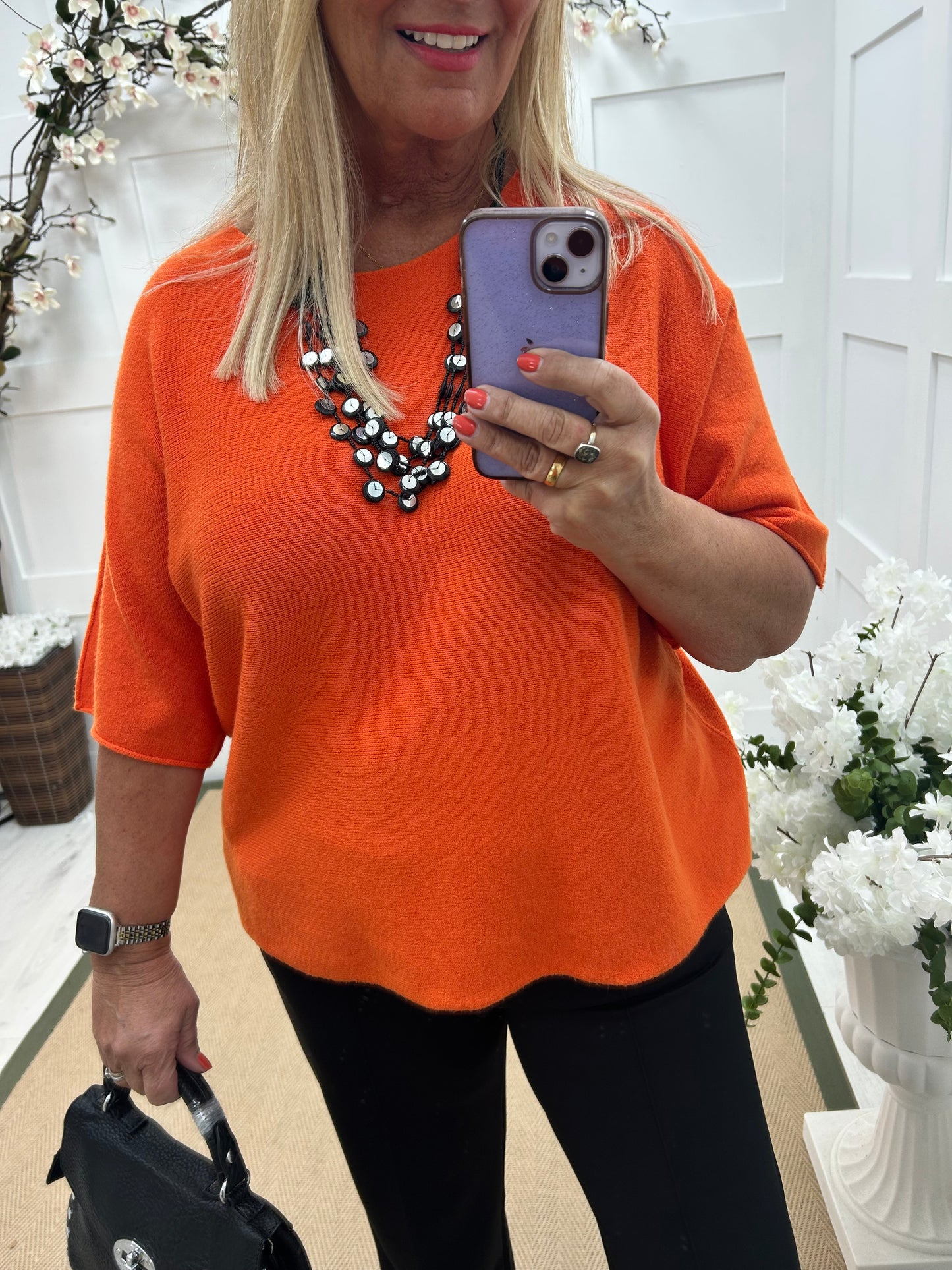 Carys: Orange short knitted top. One size: 12-18/20