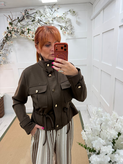 Jazz: Military style cinched waist jacket. One size 12-16