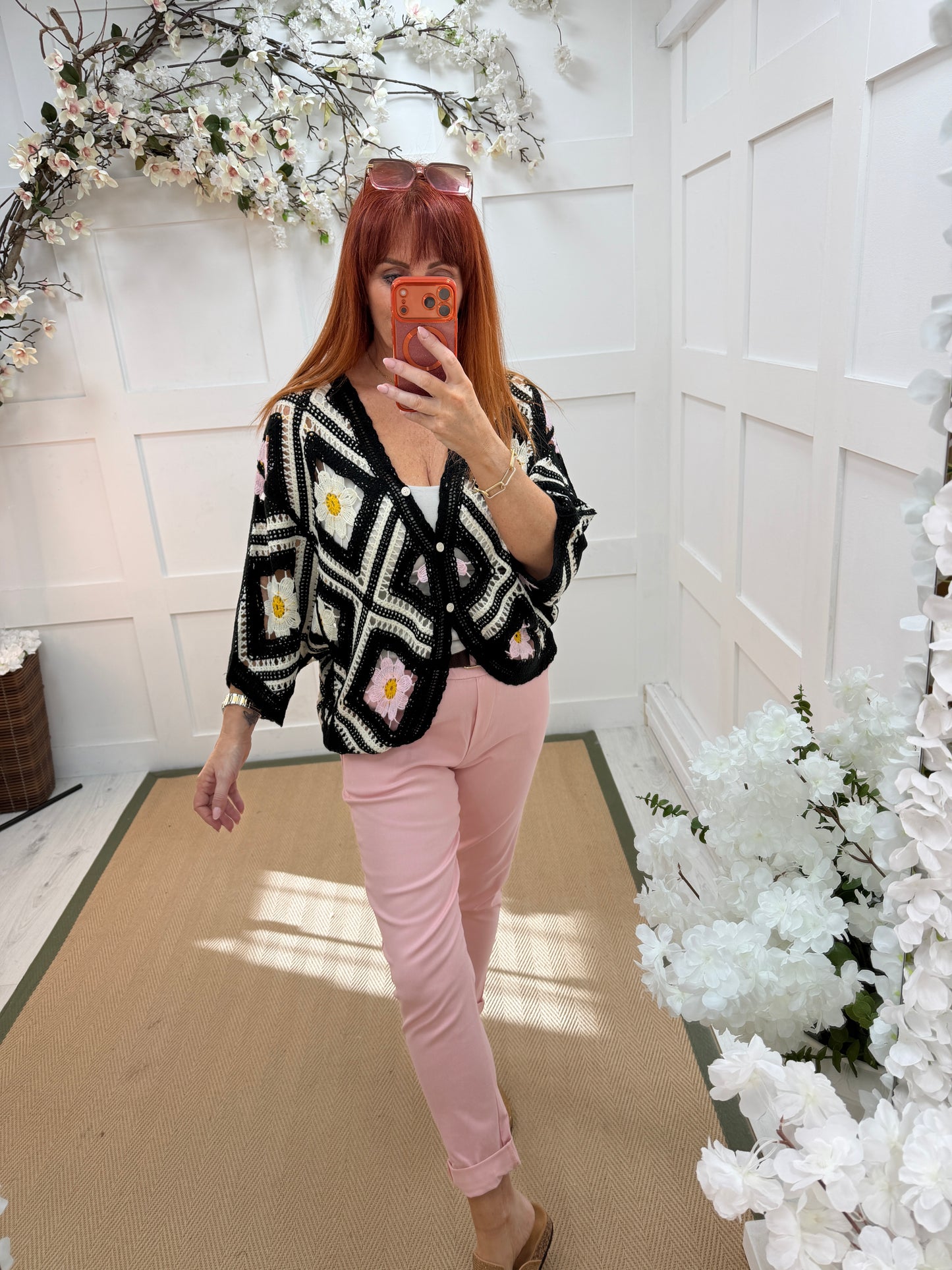 Daisy: Black floral 3/4 sleeve crochet top. One size: 12-18