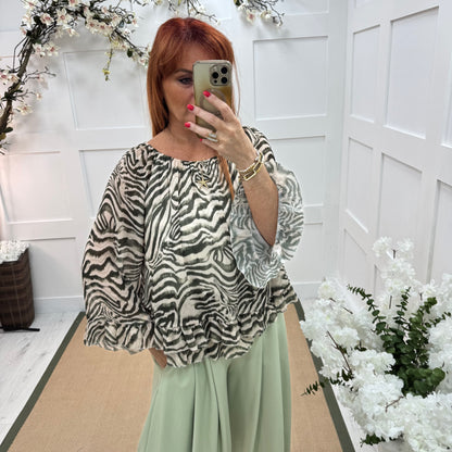 Foxy: Khaki zebra double frill chiffon top. One size: 10-20