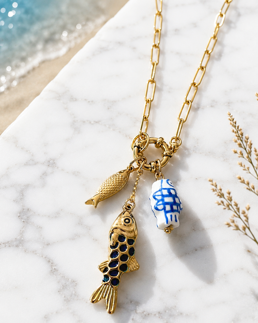 Dory: 18k gold plated multi fish necklace.