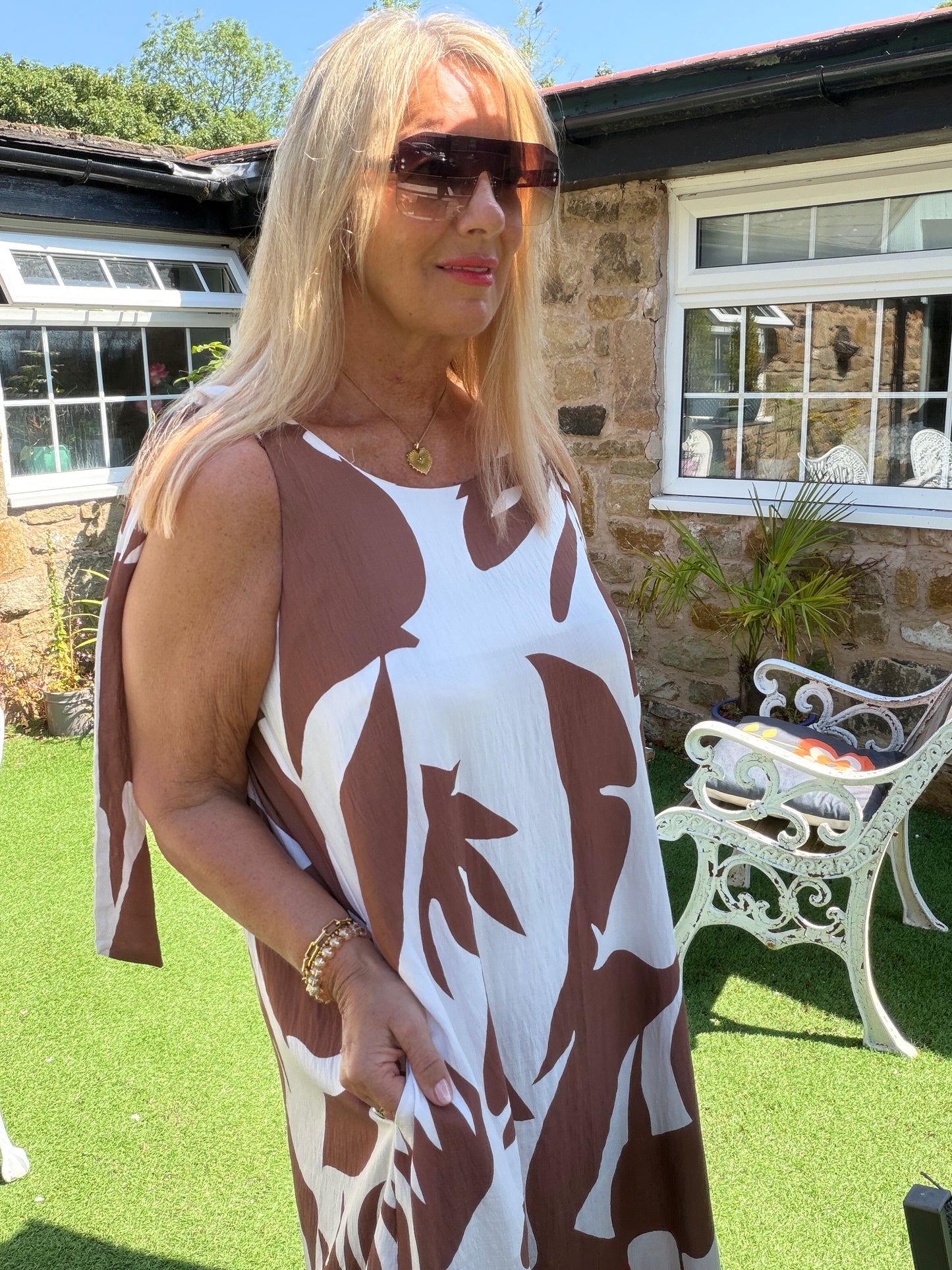 Mila: Leaf printed maxi dress with large rose gold disc detail. One size: 12-18. 2 colours