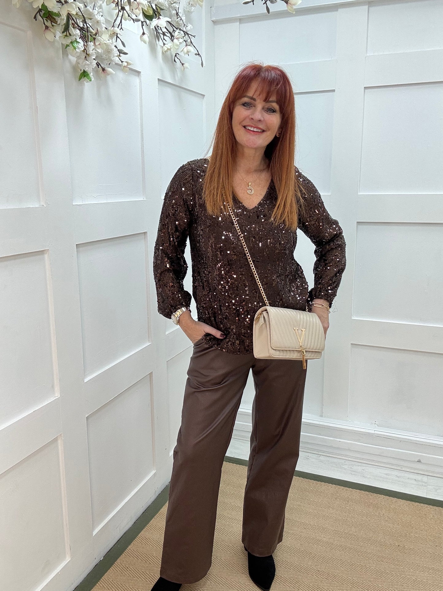 Sutton: Brown v-neck sequin top. One size: 12-16