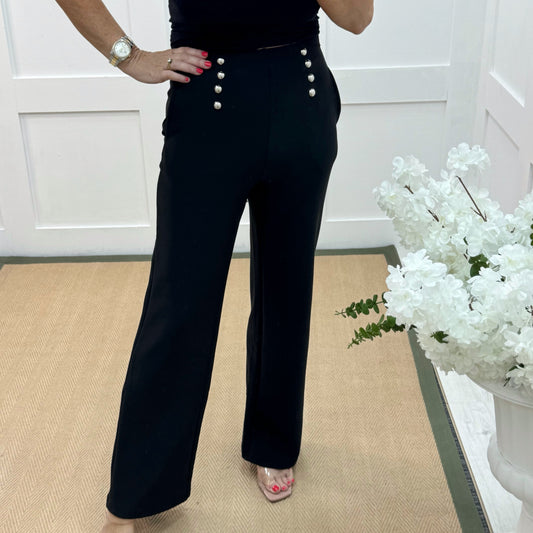 Paris: Black stretchy gold button trousers. 4 sizes