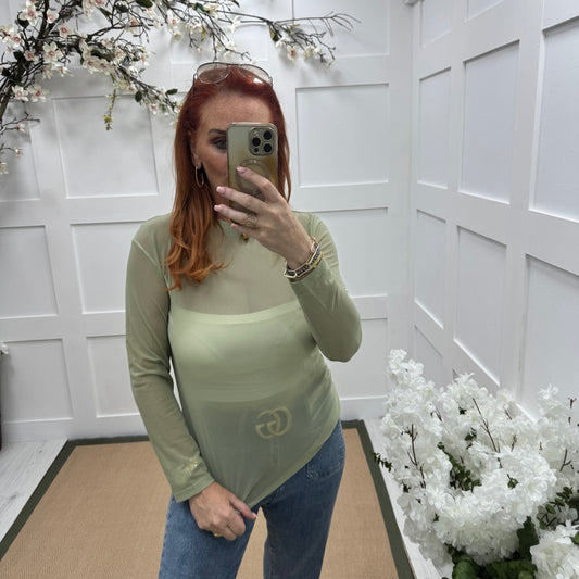 Romy: Sage green sheer mesh top. One Sz: 12-18