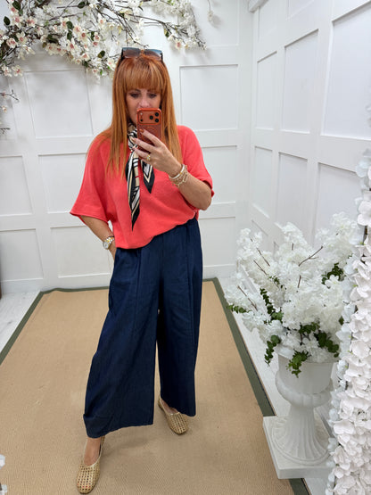 Josie: Dark denim blue barrel jean style trousers. One size: 12-18