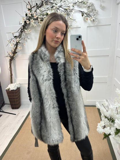 Kaya: Grey faux fur gilet. One size 10-16