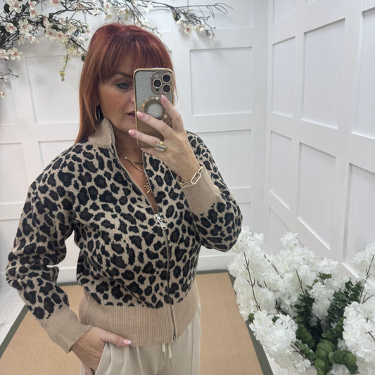 Ursula: Beige leopard print zipped neck top. One size: 12-18