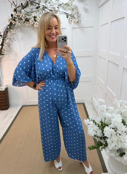 Amalia: Blue and white spotty wide leg jumpsuit. One size: 14-18