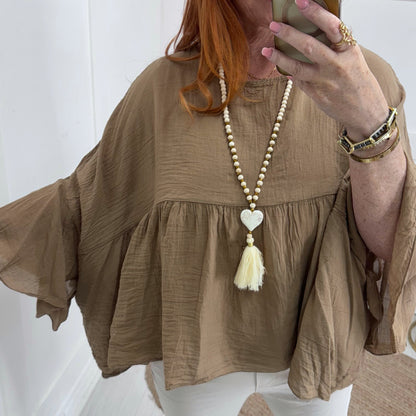 Jedda: Long white & gold bohemian heart necklace