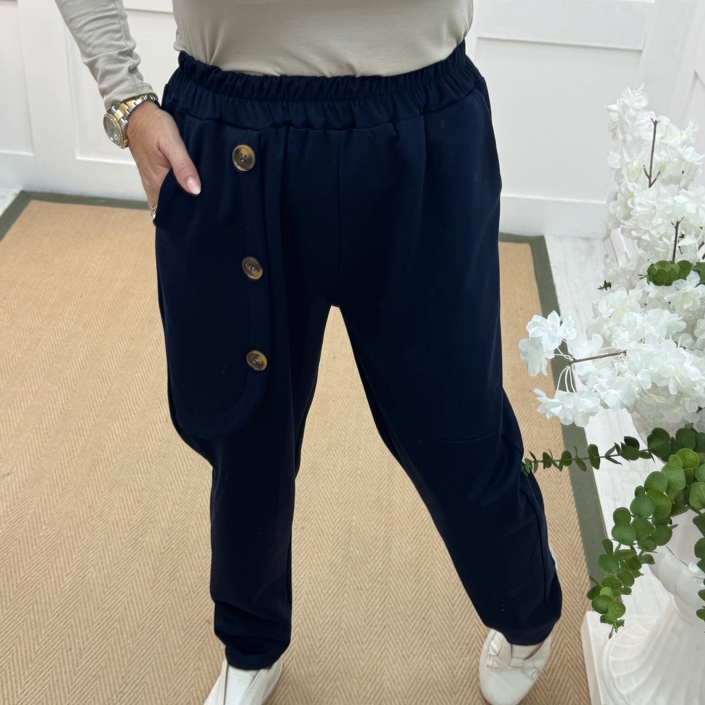 Monroe: Navy stretchy button trousers. One size: 12-18