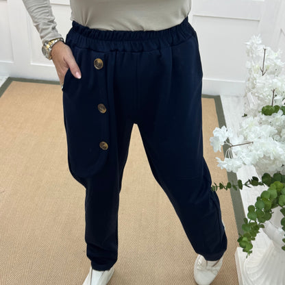 Monroe: Navy stretchy button trousers. One size: 12-18