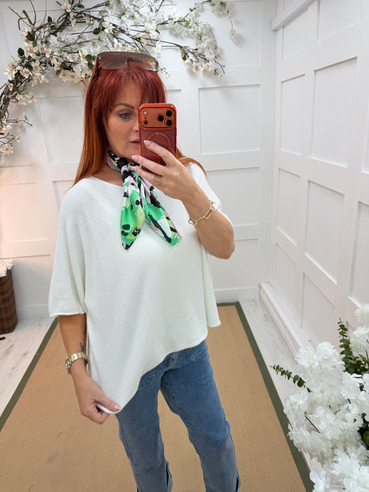 Carrie: White short knitted top. One size: 12-18/20