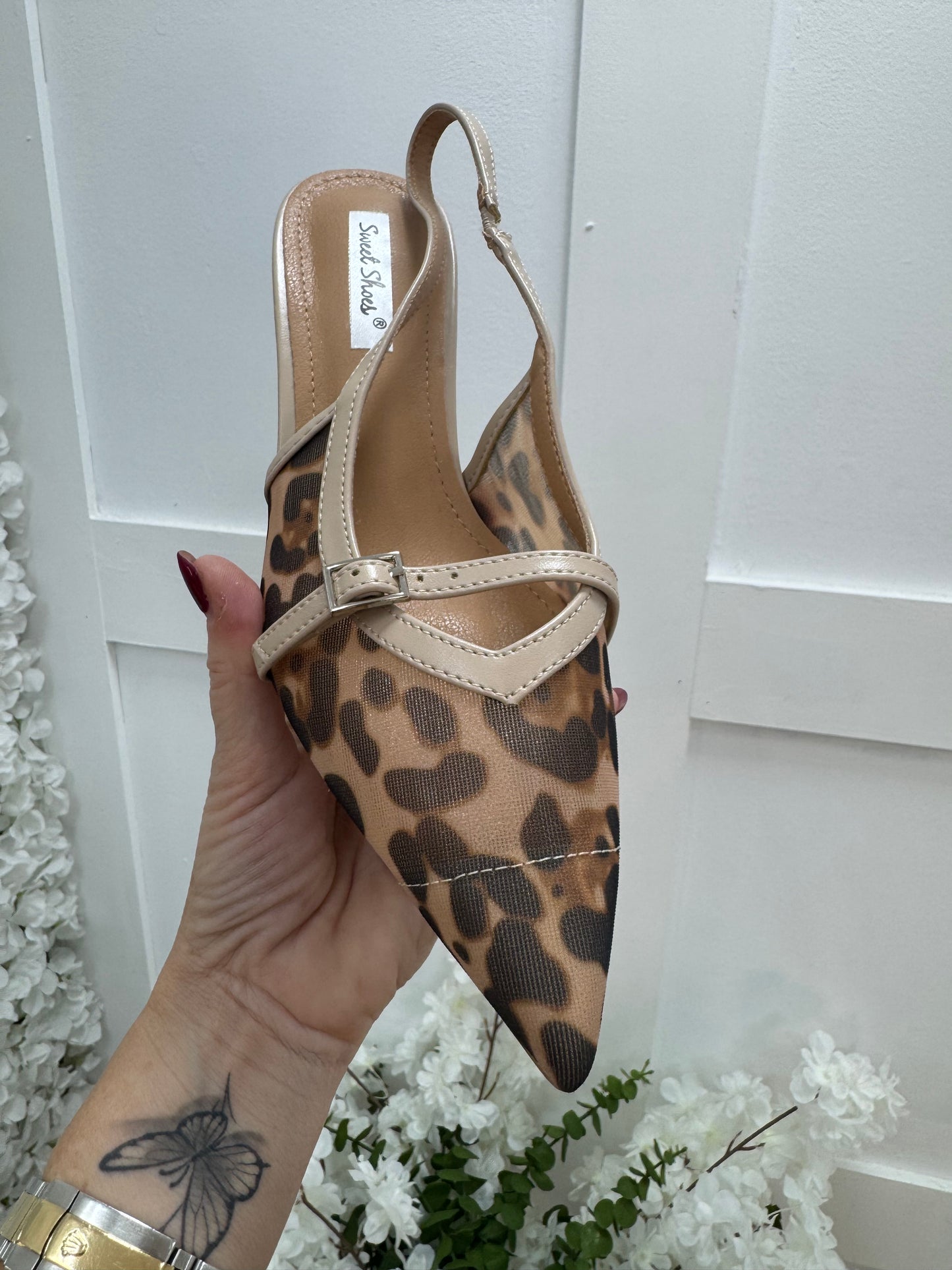 Zola: Leopard print kitten heel sling back shoes. Sizes: 3-8