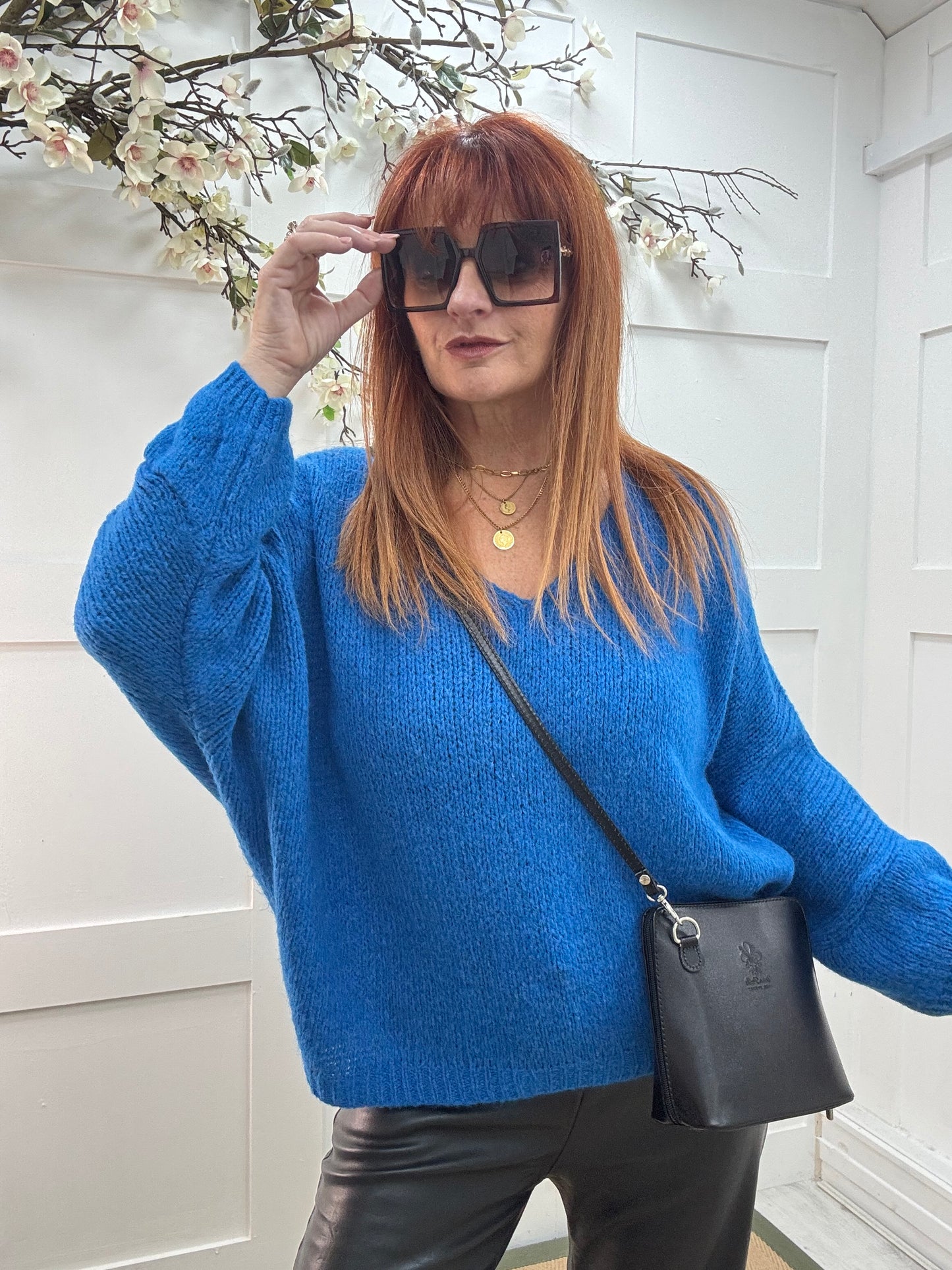 Alex: Blue V neck knitted top. One size 14-20