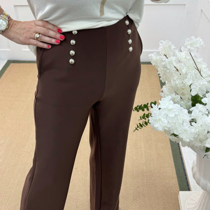 Paris: Brown stretchy silver button trousers. 4 sizes