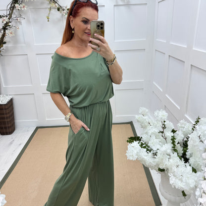 Rhianna: Khaki jersey draped wide leg jumpsuit. One size: 10-16